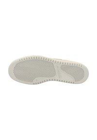 Rubber shoe sole in light beige, featuring a zigzag tread pattern and embossed branding. Smooth texture, slightly raised edges.