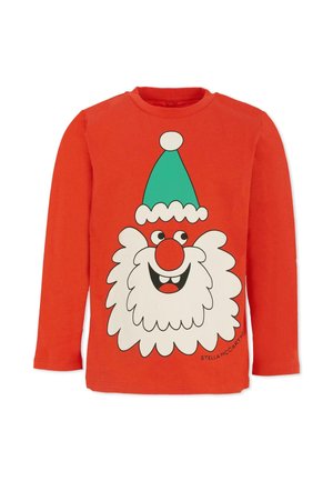 Maglietta rossa a maniche lunghe con un grande grafico di Babbo Natale con barba bianca, cappello turchese e un viso sorridente.