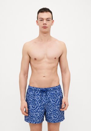 Blaue Badeshorts mit einem auffälligen abstrakten Blattmuster in dunkleren Blautönen, aus leichtem Stoff gefertigt, mit elastischem Bund und Kordelzug.