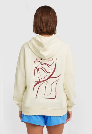 Sweat à capuche couleur crème avec une capuche à cordon, présentant un motif abstrait bordeaux au dos, avec des poignets et un ourlet côtelés.