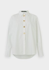 Seleccionado, white
