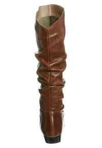 Bottine en cuir marron, hauteur genou, au design décontracté, texture lisse et bout rond. L'intérieur est de couleur claire avec une finition douce.