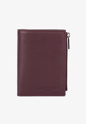 Compact burgundy leather wallet with stitched edges, zipper on the right, and "Lancaster Paris" embossed at the bottom front.