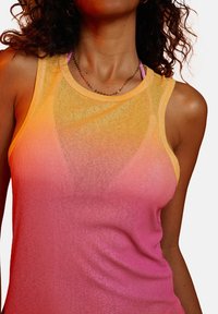 Ombre tank top in lightweight fabric, transitioning from yellow at the top to pink at the bottom, with a seamless finish and ribbed neckline.