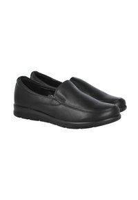 Zapatos de cuero negro tipo slip-on con punta redondeada, textura suave y detalles de costura mínimos. Presentan una suela flexible de goma negra.