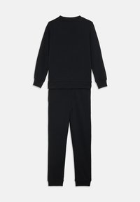 Black cotton sweatshirt and matching pants set. The top features long sleeves and a round neck, while the pants have elastic cuffs at the ankles.