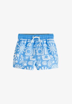 Kék fürdőnadrág fehér nap- és szivárványmintákkal, rugalmas derékrésszel és elöl fehér húzózsinórral.