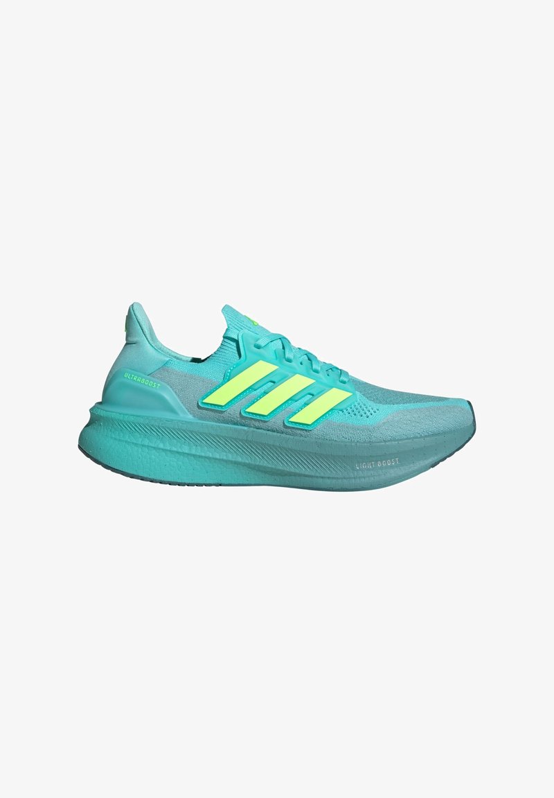 Light blue athletic shoe with a breathable mesh upper, three bright green stripes, and a cushioned sole labeled "Light Boost."