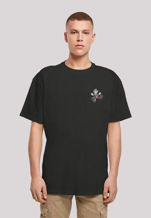 Black cotton t-shirt with short sleeves, featuring a small colorful cartoon graphic on the chest. Crew neck, relaxed fit, soft texture.