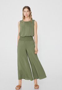 Tezenis GESMOKTE CROPPED - Kalhoty - grün w verde safari