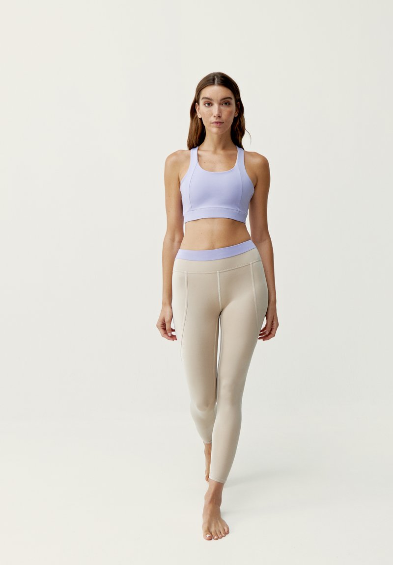 Born Living Yoga Reggiseno sportivo con sostegno medio beige
