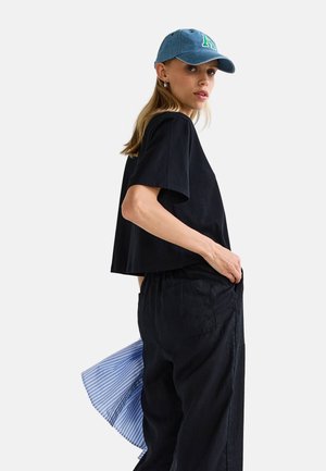 Monoprix, À MANCHES COURTES UNI - T-shirt basique - noir