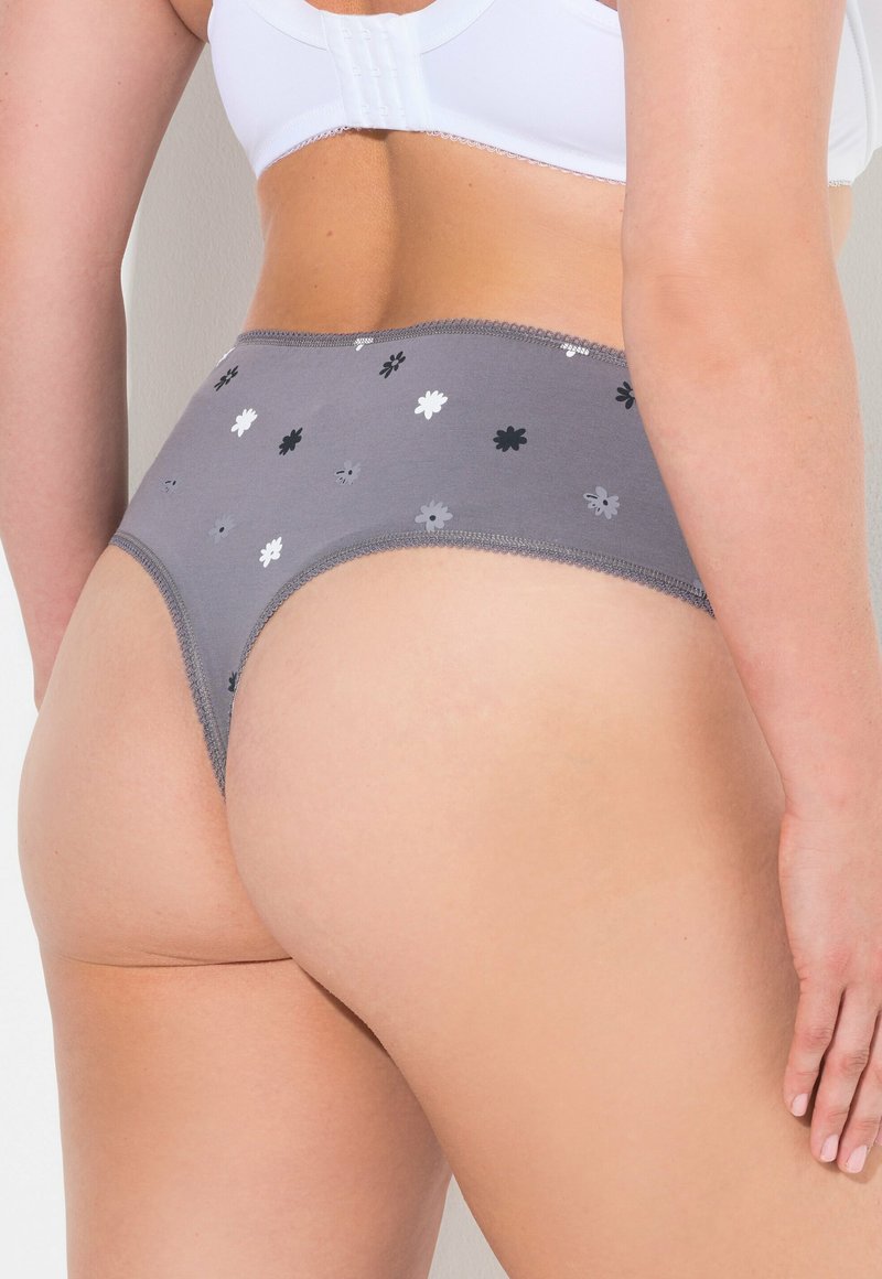 Boxer in cotone grigio con motivi floreali in bianco, nero e grigio. Presenta una vita morbida e una texture liscia.