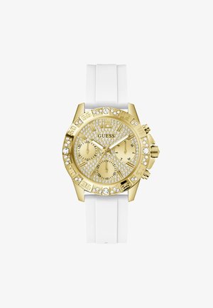 Montre chronographe en or avec un bracelet en silicone blanc, accents en cristal étincelants et un cadran texturé avec de grands marqueurs d'heure en gras.