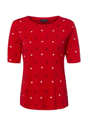 Red short-sleeve shirt with round neck, patterned with small navy anchors and white hearts evenly distributed across the fabric.