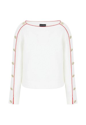 Top bianco a maniche lunghe con cuciture di accento rosse lungo le spalle, caratterizzato da bottoni dorati sulle maniche e un design a vestibilità comoda.