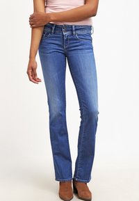 Slimmade blå denimjeans med midjhöjd, raka ben och subtila blekningar. Har klassisk femficksdesign och metallknappdetaljer.