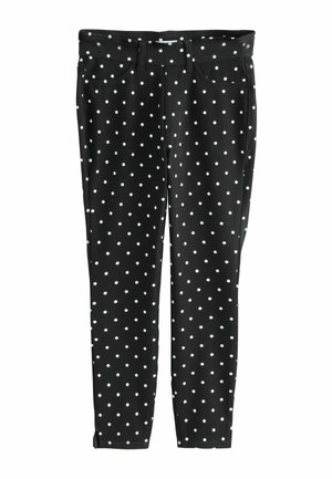 Czarne wąskie spodnie w białe kropki, z szlufkami na pasek, przednimi kieszeniami oraz zapięciem na guzik w pasie.