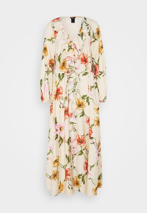 Květinové zavinovací šaty v krémové barvě, s růžovými, oranžovými a žlutými květy. Volánek kolem výstřihu, dlouhé rukávy a pás s uvázaným detailem.