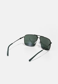 Armani Exchange Aurinkolasit - matte green