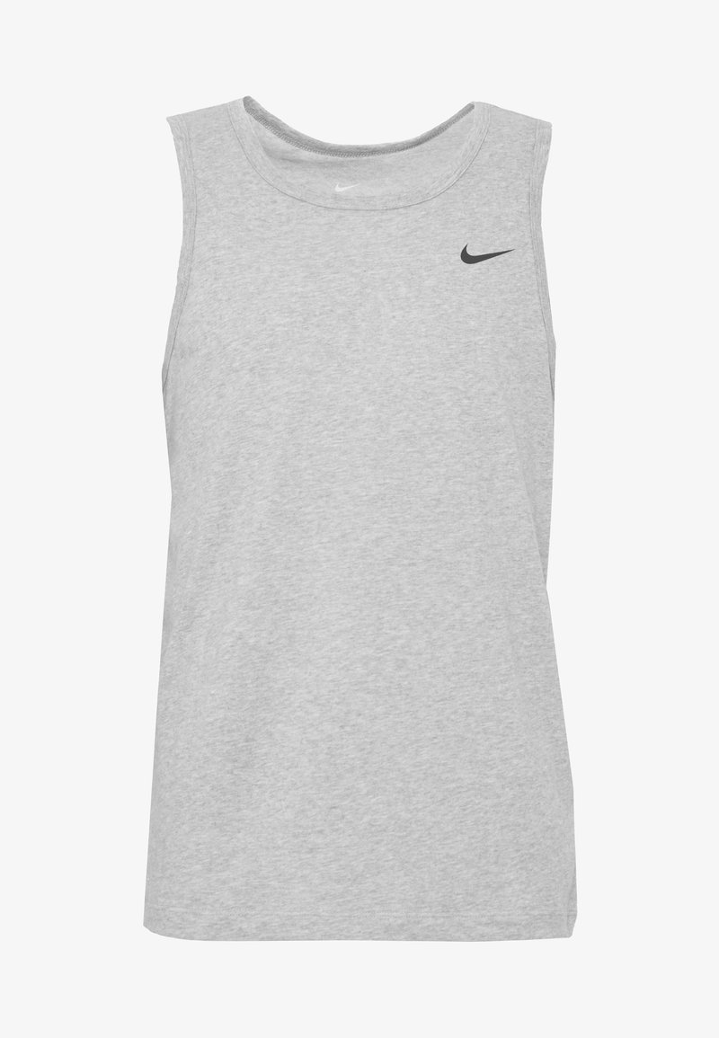 Gaišs pelēks bez piedurknēm sporta krekls, kas izgatavots no mīksta kokvilnas sajaukuma, ar apaļu kakla izgriezumu un mazu melnu Nike logo kreisajā augšējā krūtī.