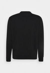 Sweat-shirt noir à manches longues avec poignets et ourlet côtelés, vu de dos.