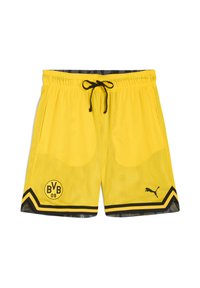 Gule mesh sportsshorts med sorte detaljer, der har en snøre i taljen, holdets logo og et diagonalt stribe mønster ved kanten.