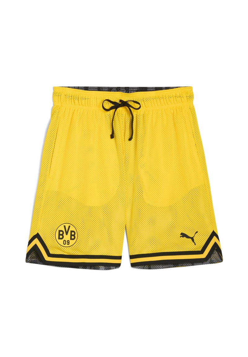 Gule mesh sportsshorts med sorte detaljer, der har en snøre i taljen, holdets logo og et diagonalt stribe mønster ved kanten.