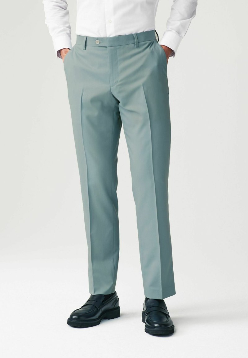 Next MOTIONFLEX TAILORED - Hlače za moške obleke - light blue