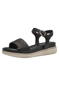 Svart lädersandal med ett vävt svart rem, justerbar spänne och en beige gummisula. Har en dämpad innersula för komfort.