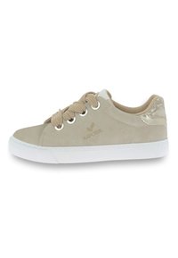 Beige sneaker with suede material, round toe, white rubber sole, and beige laces. Notable metallic accent on the heel and logo detail.