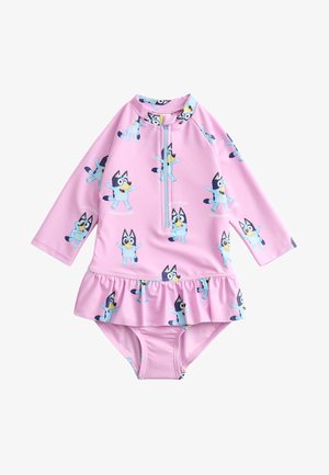 Maillot de bain rose à manches longues pour tout-petit, avec jupe à volants, fermeture éclair à l'avant et motif répétitif de dessins animés de chiots bleus espiègles.