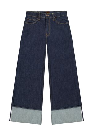 Blugi largi de culoare albastru închis cu tivuri întoarse care arată denim mai deschis la culoare în interior, având buzunare frontale, șlițuri pentru curea și închidere cu nasture.