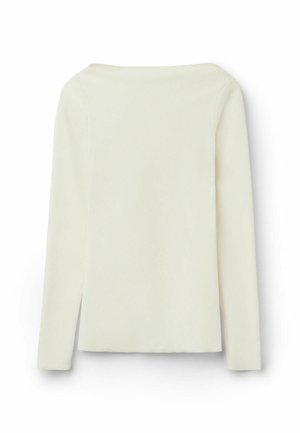 Top de manga larga en tejido blanco roto, con un escote amplio y aberturas laterales. Textura suave con un diseño simple y limpio.