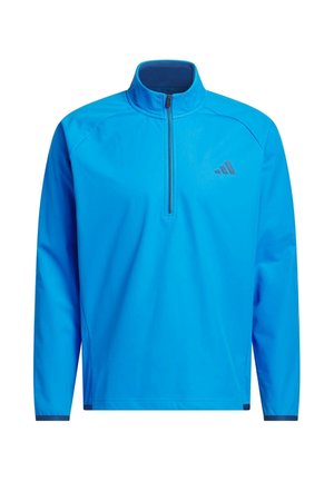 Pull-over de sport à manches longues bleu vif avec une fermeture éclair quart de longueur et un petit logo sombre sur la poitrine gauche.