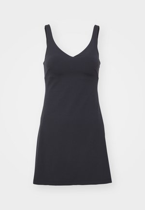 Musta ilmanhiha dressi, joka on valmistettu sileästä kankaasta, ja jossa on V-pääntie sekä istuva yläosa, joka virtaa hieman levenevään hameeseen.