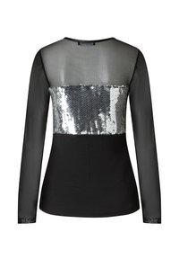 Zwart lang mouwen shirt met doorzichtige stof op de schouders en een zilveren paillettenpaneel op de bovenrug. Overal een gladde textuur.