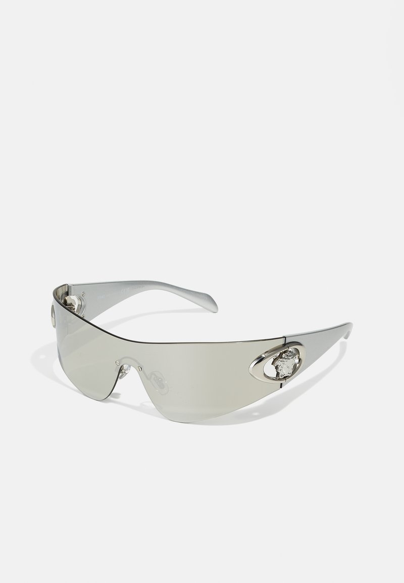 Sonnenbrille mit grauem Farbton, schlankem transparentem Rahmen und silbernen Hardware-Akzenten. Verfügt über ein markantes ovales Detail an den Seiten.