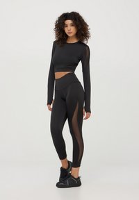 Terranova ACTIVE CON TRASPARENZE - Leggings - nero