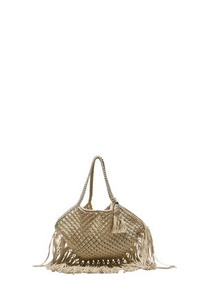 Sac à main en paille tressée beige avec longues anses, pampille décorative et franges en bas et sur les côtés.