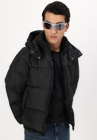 COACH PUFFER JACKET - Jakna ispunjena paperjem - black
