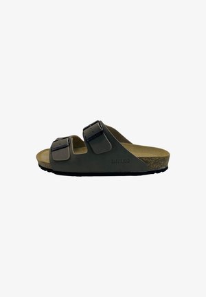 Sandalo marrone con due cinturini con fibbie regolabili, soletta in sughero e suola nera, mostrato in profilo su sfondo bianco.