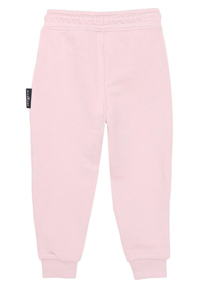 Pantaloni della tuta rosa chiaro realizzati in materiale morbido, dotati di vita elasticizzata, polsini a coste e un'etichetta sul lato sinistro.