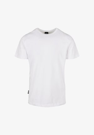 Valge puuvillane T-särk lühikeste varrukatega, ümar kaelus ja sirge lõige. Küljel on väike must brändi silt.