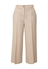 Pantalon beige à jambes larges en tissu léger avec une fermeture par bouton, présentant des plis, une texture lisse et une coupe ajustée.
