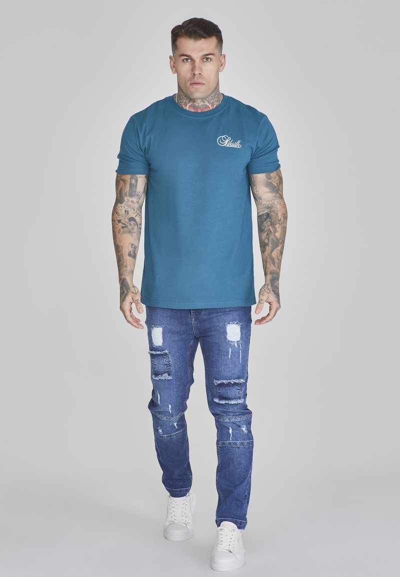 SikSilk Slim fit jeans blauw SikSilk Slim fit jeans blauw