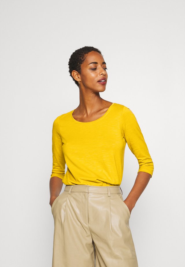 Topper langermet - brass yellow