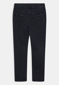 Svarta denimjeans med rak benställning, bakfickor och en ren finish, med minimal sömnad och en slät yta.