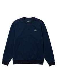 Mørkeblå hettegenser laget av teksturert bomull. Har rund hals, ribbede mansjetter og en liten grønn logo på brystet. Enkel design.