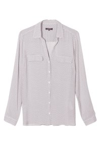 Biała, lekką bluzka z długim rękawem z małym, powtarzającym się wzorem geometrycznym. Posiada zapięcie na guziki z przodu oraz dwie kieszenie na piersi.